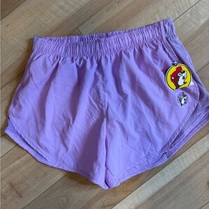 Buc-ees’s Purple Athletic Shorts with Elastic Waistband and Curved Hem